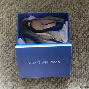Brand new black kitten heel gold detailing Stuart Weitzman shoes. Never worn.